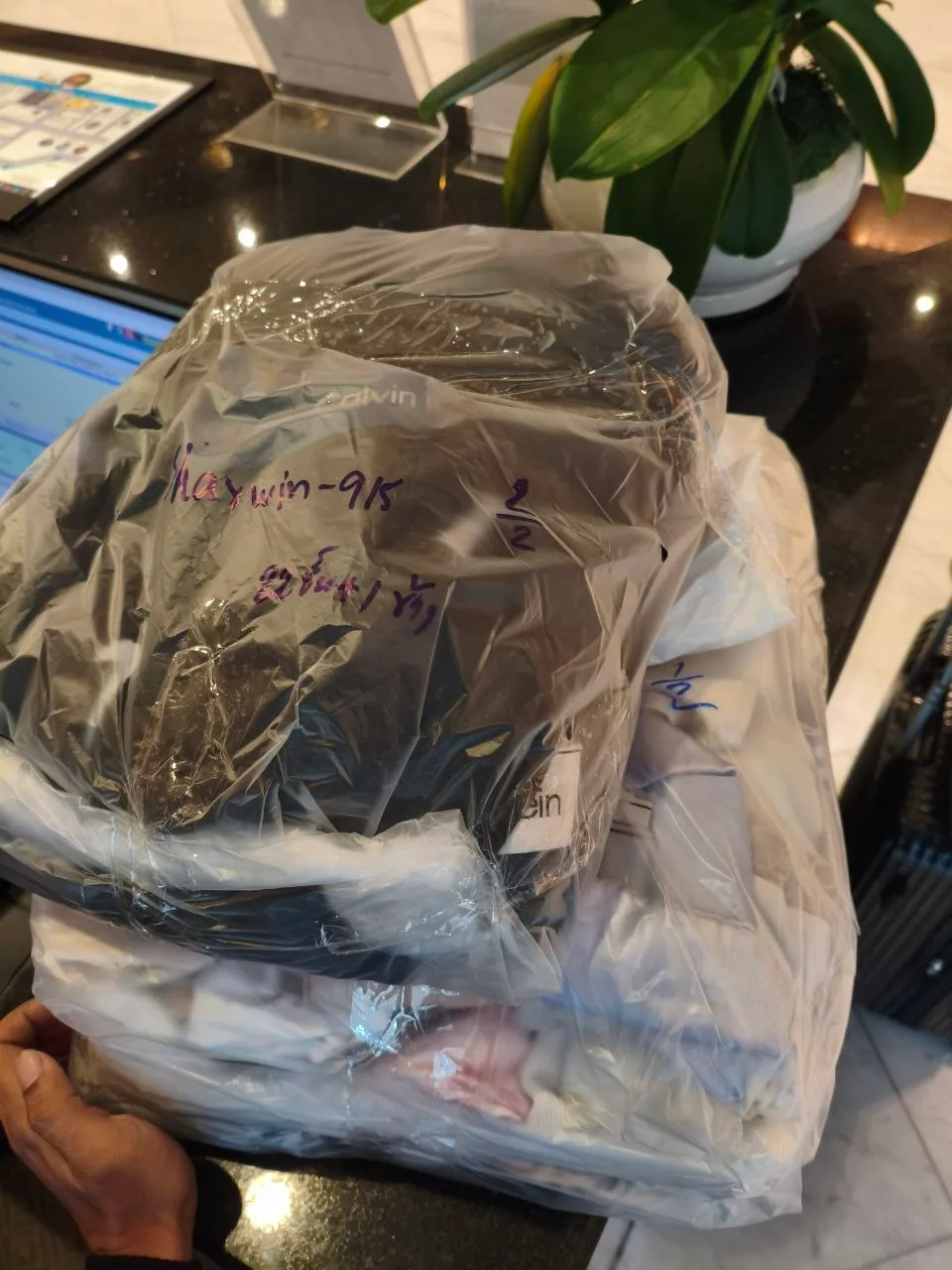 Clean laundry returned to the front desk at Four Seasons Private Residences, Riverside–Charoen Krung, Bangkok