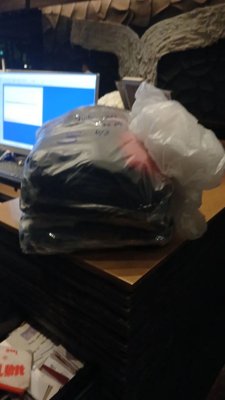 Clean laundry returned to the front desk at JC Kevin Sathorn Bangkok Hotel, Sathon–Silom–Surawong, Bangkok