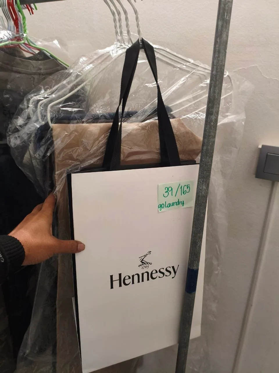 Wash & Iron returned on hangers at Saladaeng One, Sathon–Silom–Surawong, Bangkok