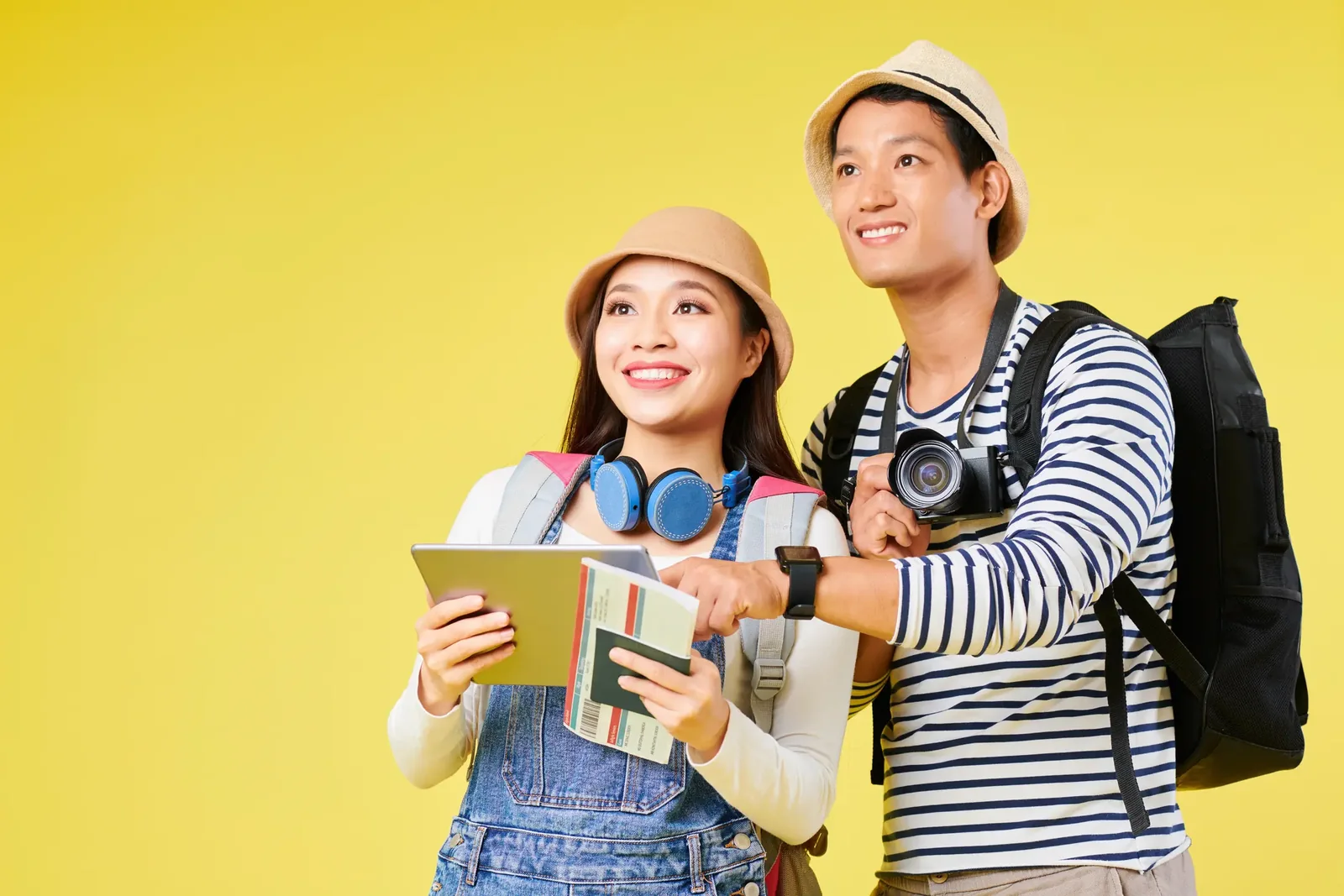 Two travellers planning their Bangkok itinerary